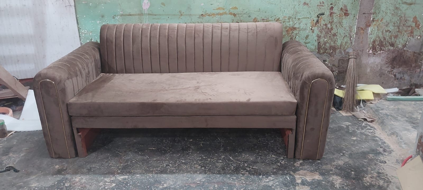 Warm mocha brown straight 3-seater custom sofa with vertical channel back and gold piping