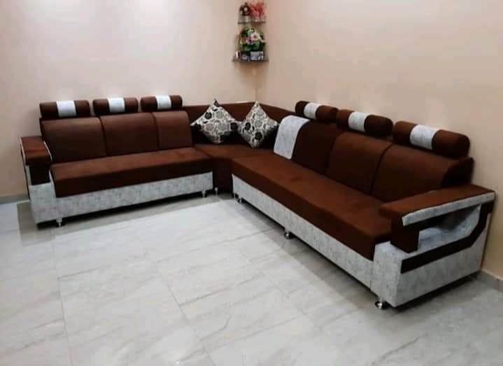 Finished custom chocolate brown and beige corner sofa installed in an apartment living room