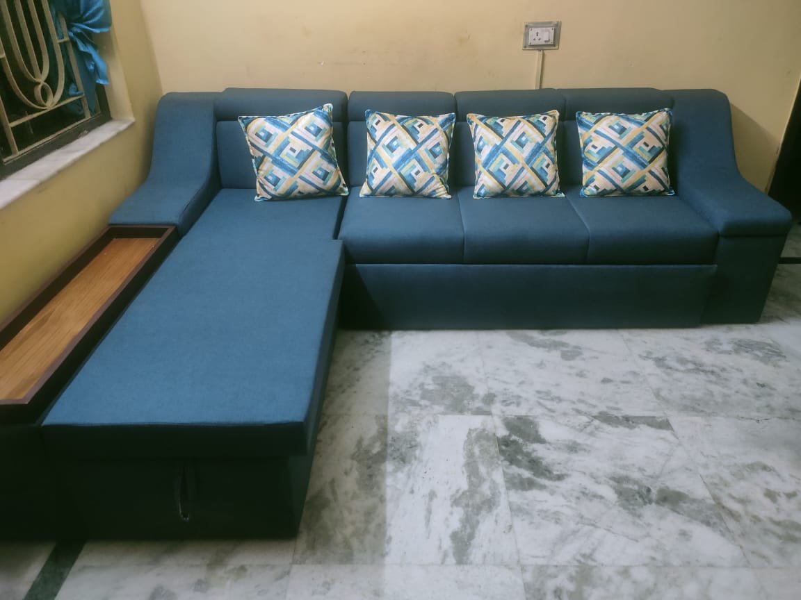 Custom blue L-shape sectional sofa with built-in wooden side console tray armrest