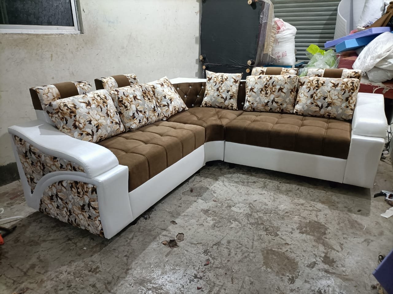 Warm brown velvet and white leatherette tufted seating detailing